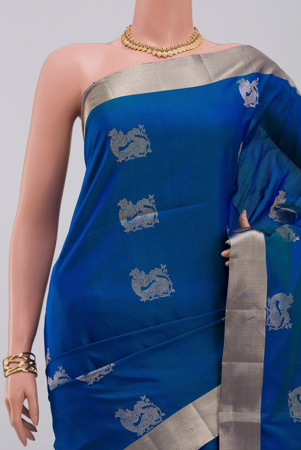 Border image of Blue Soft Silk Saree with Zari Butta on the body and Zari Border. 