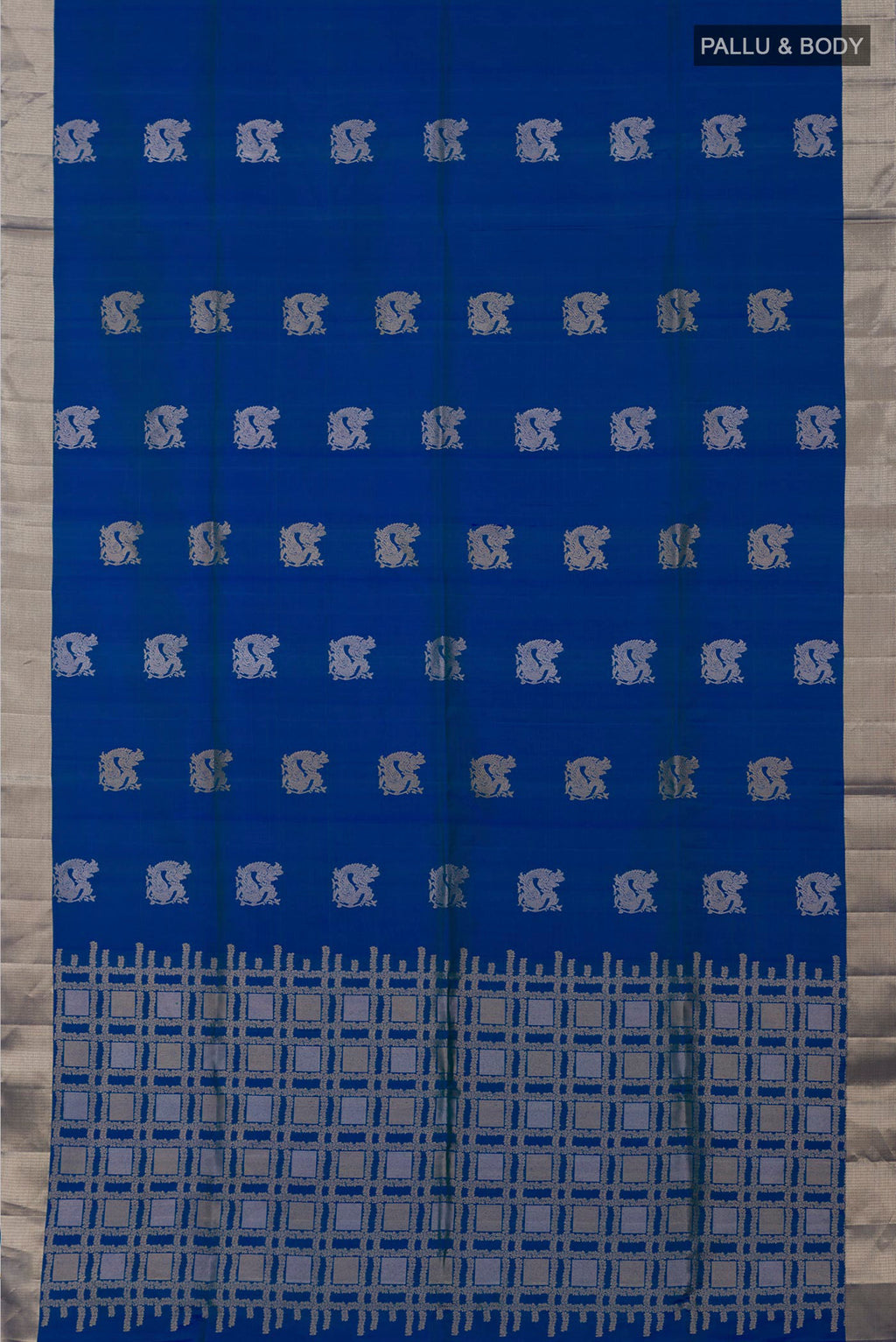 Flat view of Blue Soft Silk Saree with Zari Butta on the body and Zari Border. 
