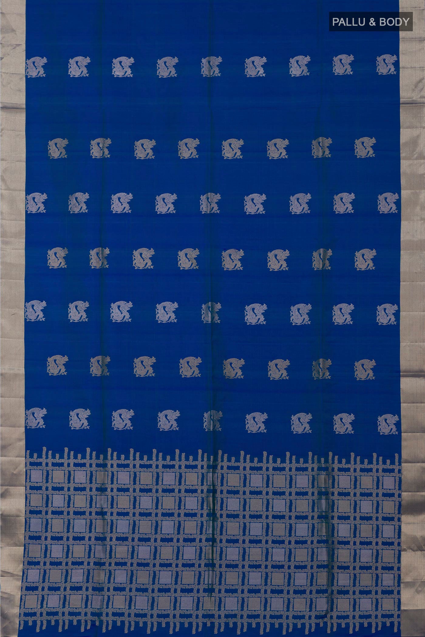 Flat view of Blue Soft Silk Saree with Zari Butta on the body and Zari Border. 
