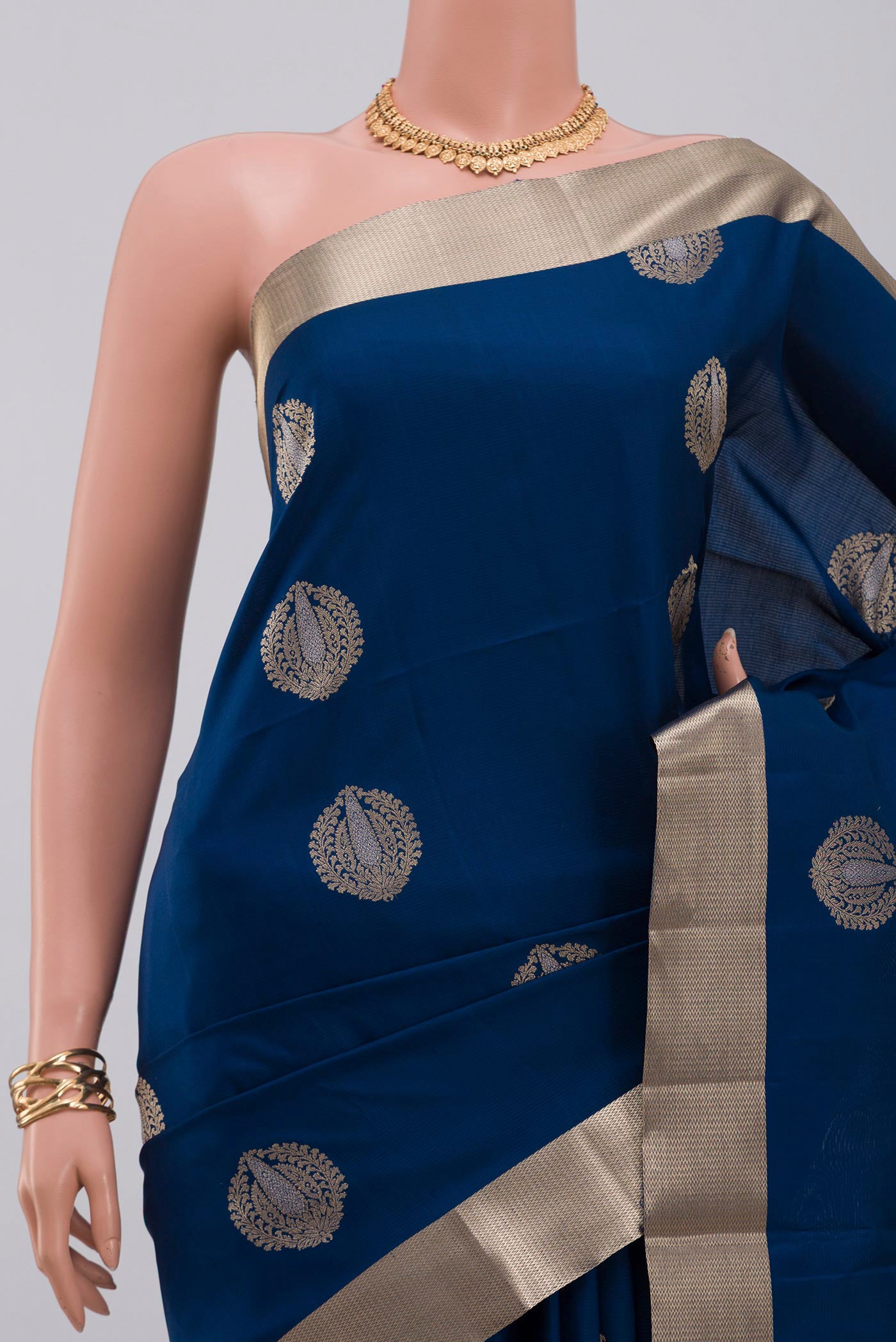 Border image of Blue Soft Silk Saree with Zari Butta on the body and Zari Border. 