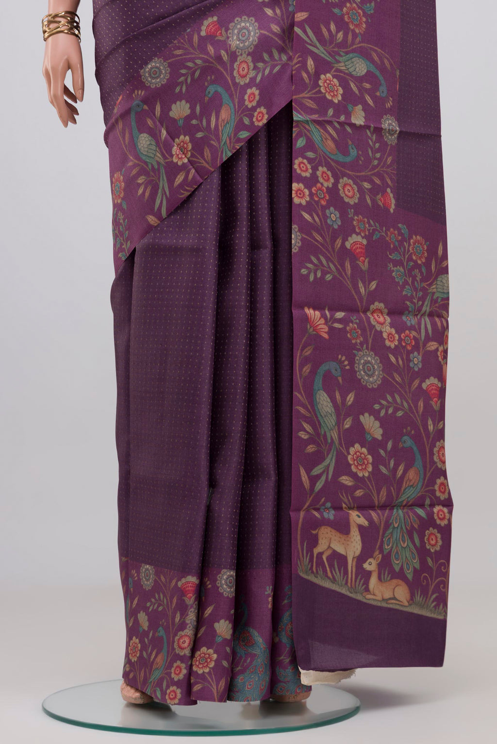 Pleats and pallu of Purple Tussar Silk Saree with Stripes on the body and Printed Border. 