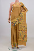 Mustard Tussar Saree with Checked design on the body and Printed Border.  displayed on a mannequin