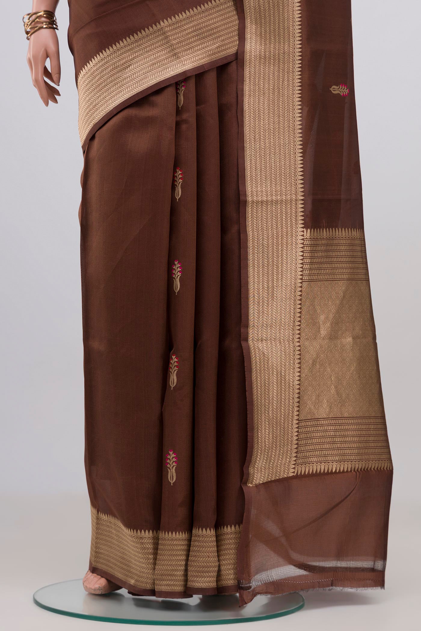 Pleats and pallu of Brown Banarasi Katan Silk Saree with Zari Butta on the body and Zari Border. 