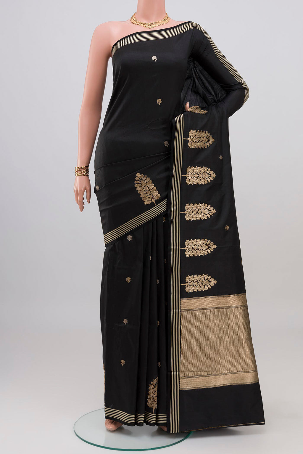 Black Banarasi Katan Silk Saree with Zari Butta on the body and Zari Border.  displayed on a mannequin