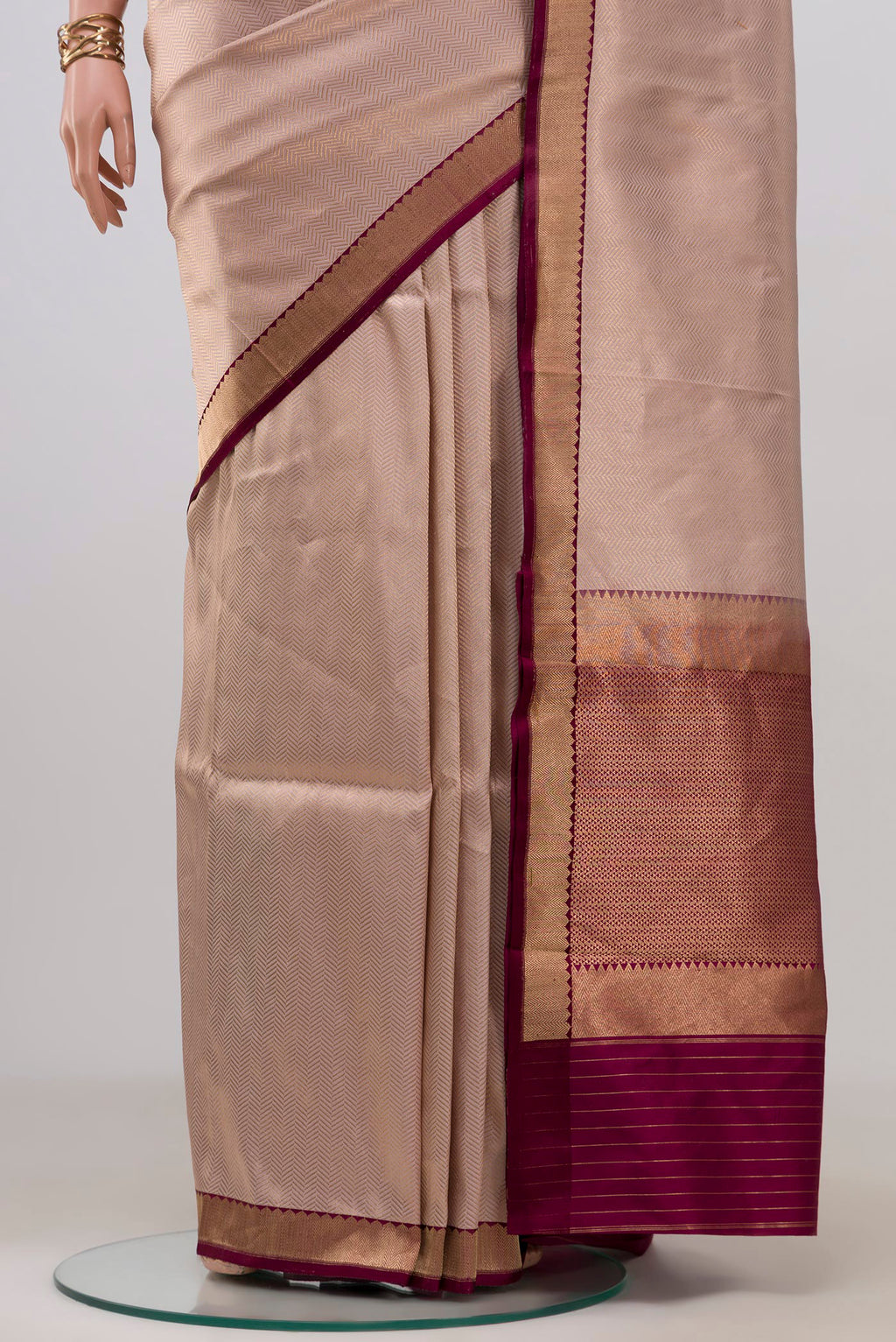 Pleats and pallu of Rose Gold Banarasi Katan Silk Saree with Zari Brocade on the body and Zari Border. 