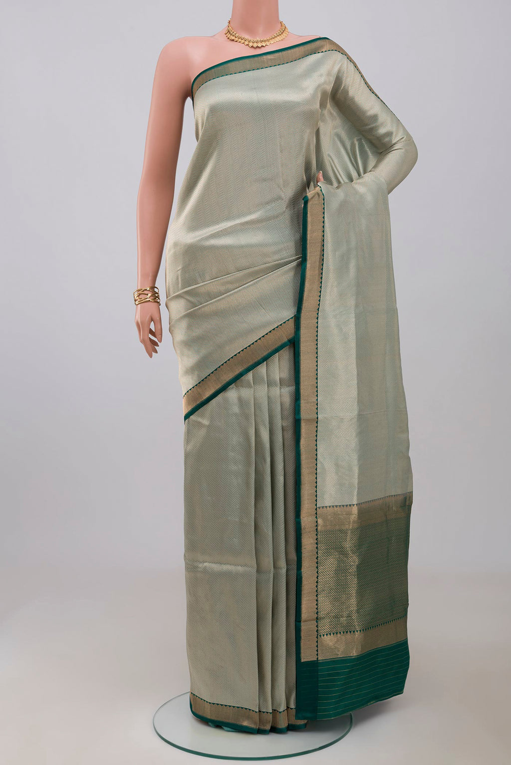 Light Blue Banarasi Katan Silk Saree with Zari Brocade on the body and Zari Border.  displayed on a mannequin