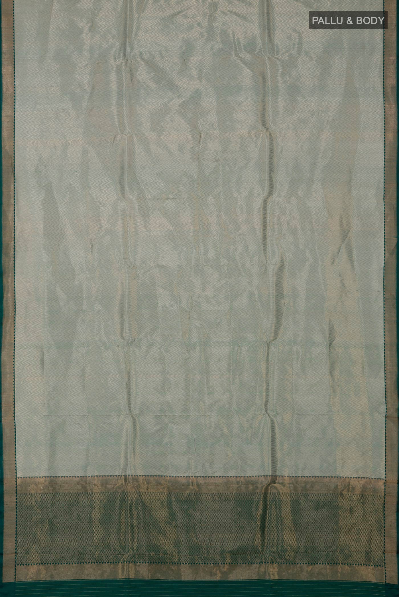 Flat view of Light Blue Banarasi Katan Silk Saree with Zari Brocade on the body and Zari Border. 