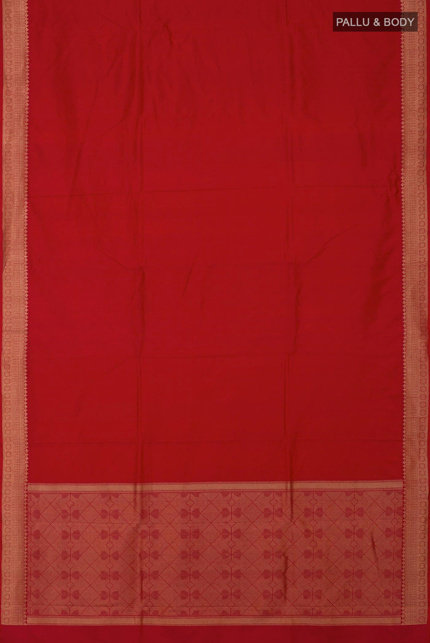 Flat view of Red Banarasi Katan Silk Saree with Jacquard design on the body and Zari Border. 
