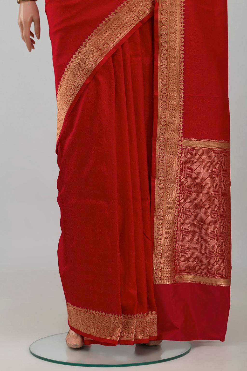 Pleats and pallu of Red Banarasi Katan Silk Saree with Jacquard design on the body and Zari Border. 