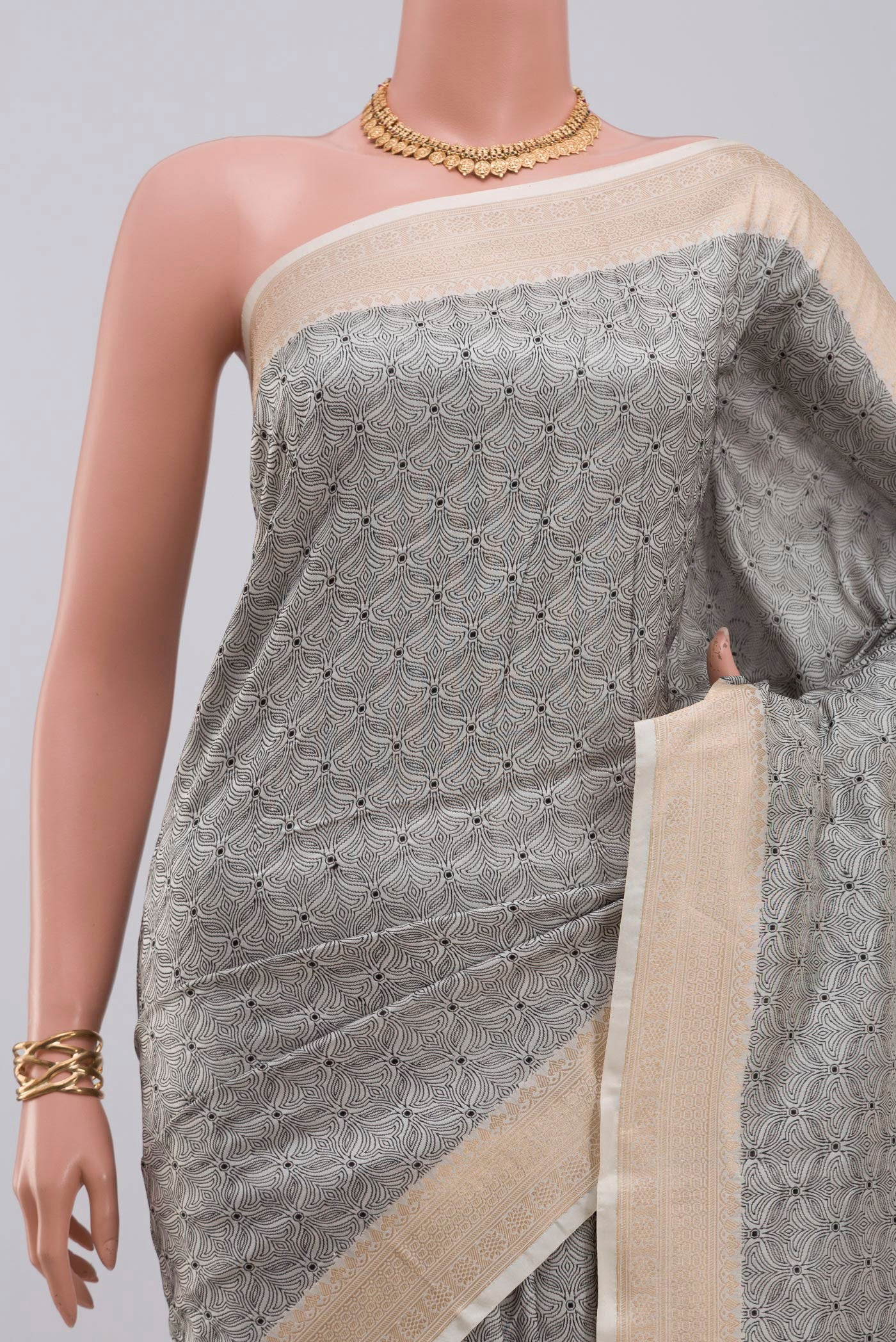 Border image of Cream Banarasi Katan Silk Saree with Jacquard design on the body and Zari Border. 