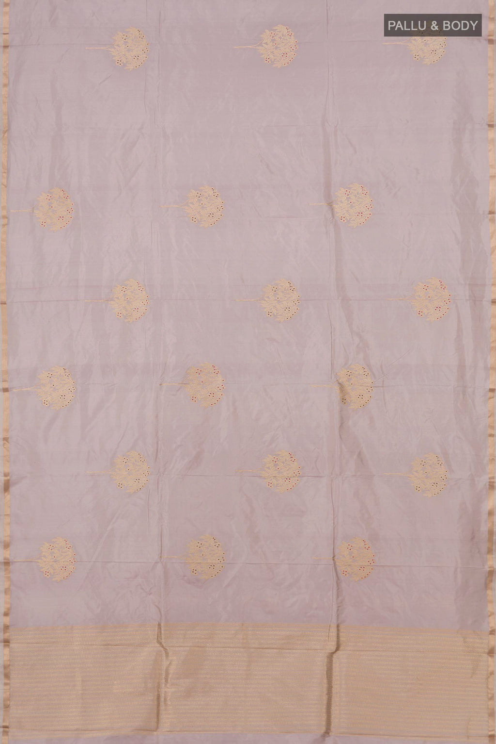 Flat view of Lavender Banarasi Katan Silk Saree with Zari Butta on the body and Thin Zari Line. 