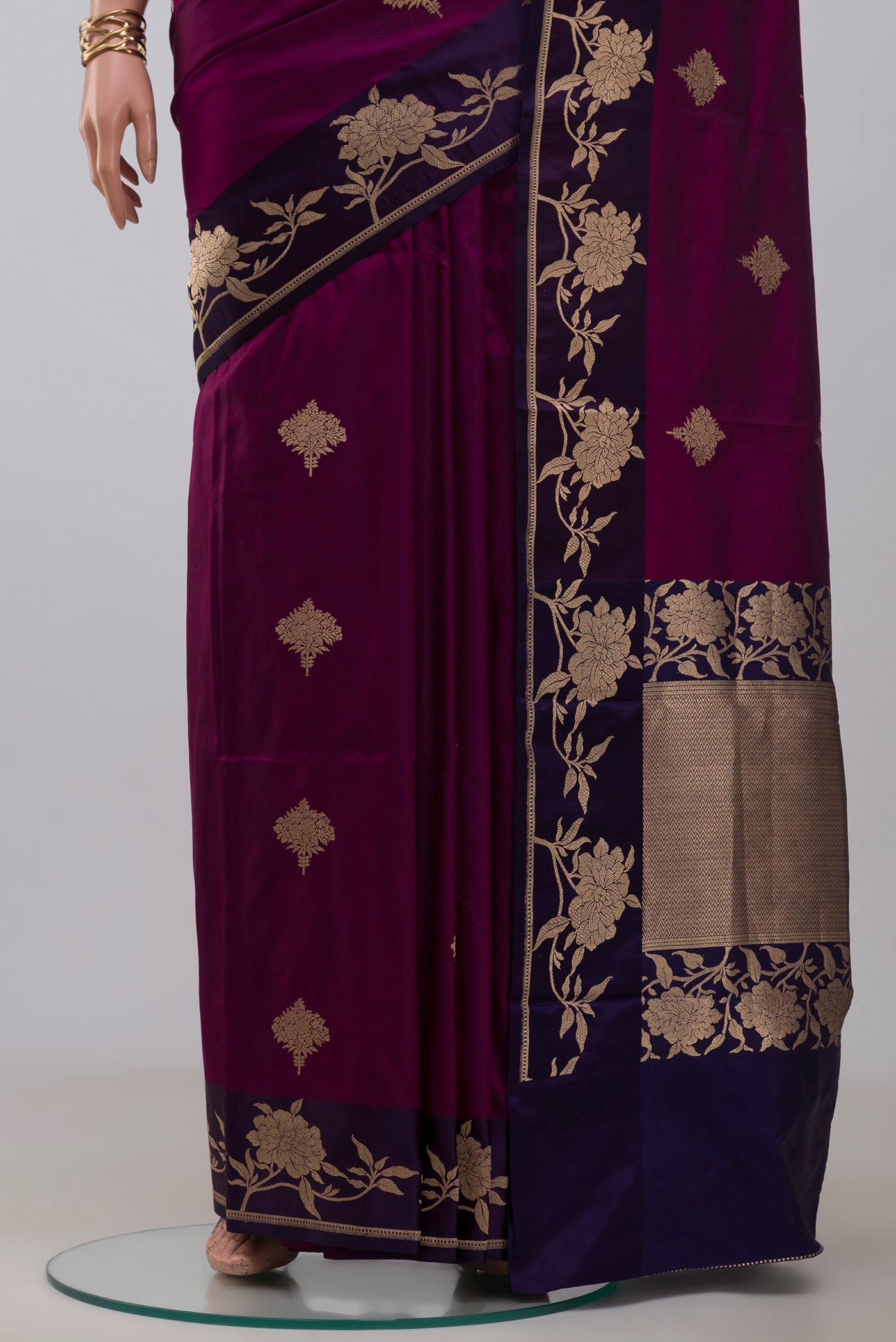Pleats and pallu of Purple Banarasi Katan Silk Saree with Zari Butta on the body and Fancy Border. 