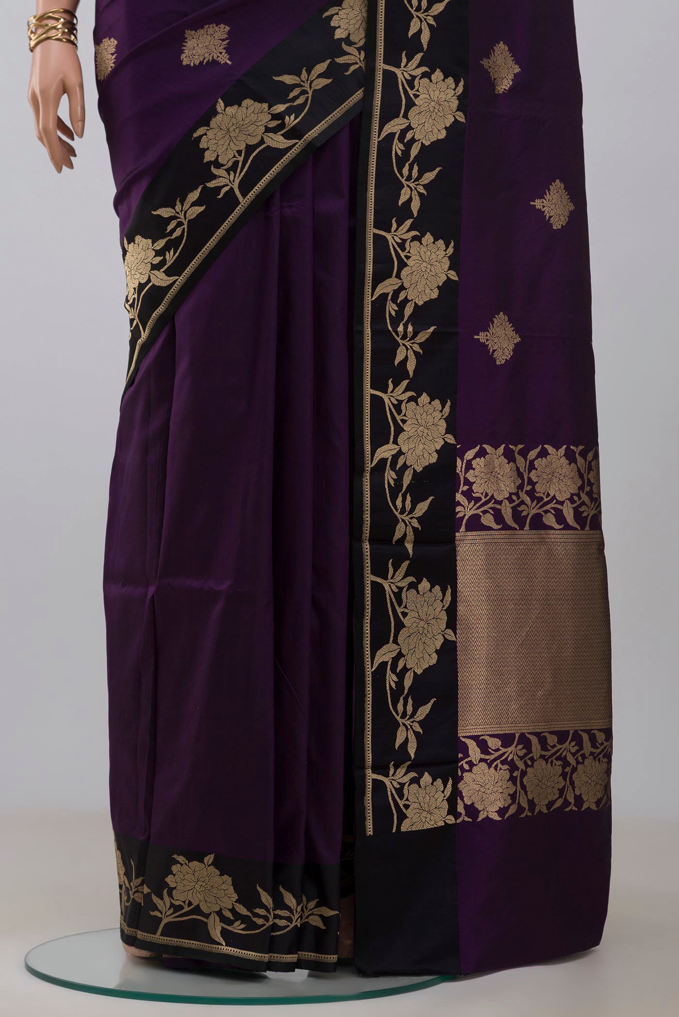 Pleats and pallu of Purple Banarasi Katan Silk Saree with Zari Butta on the body and Fancy Border. 
