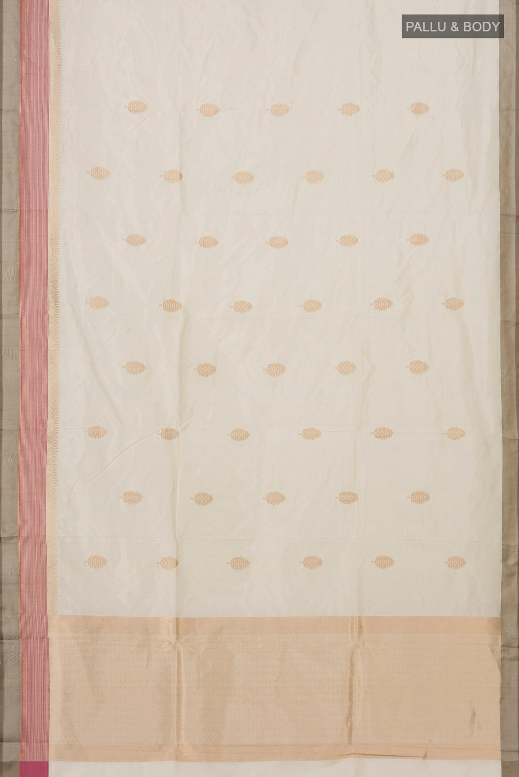 Flat view of Cream Banarasi Katan Silk Saree with Zari Butta on the body and Zari Border. 