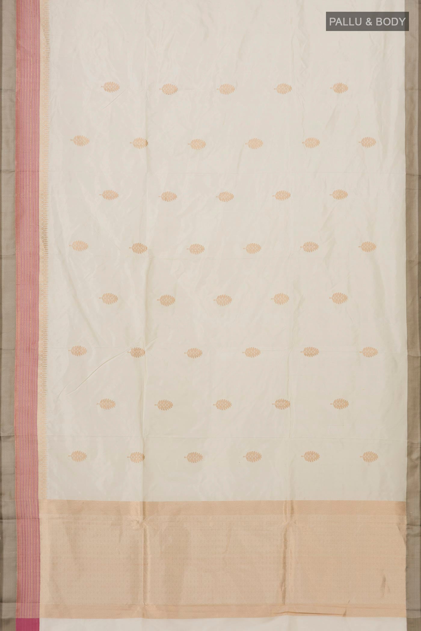 Flat view of Cream Banarasi Katan Silk Saree with Zari Butta on the body and Zari Border. 