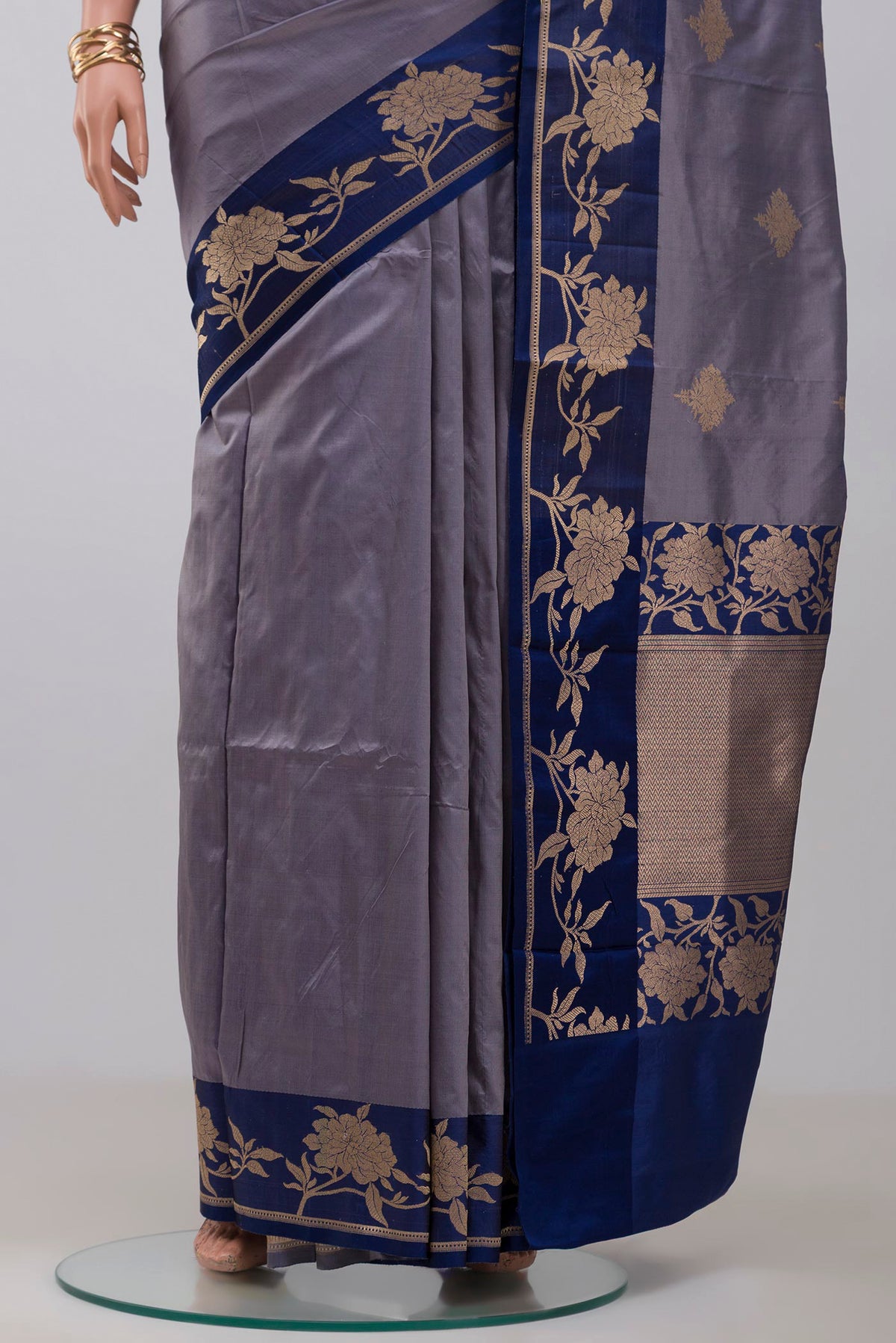 Pleats and pallu of Blue Grey Banarasi Katan Silk Saree with Zari Butta on the body and Fancy Border. 