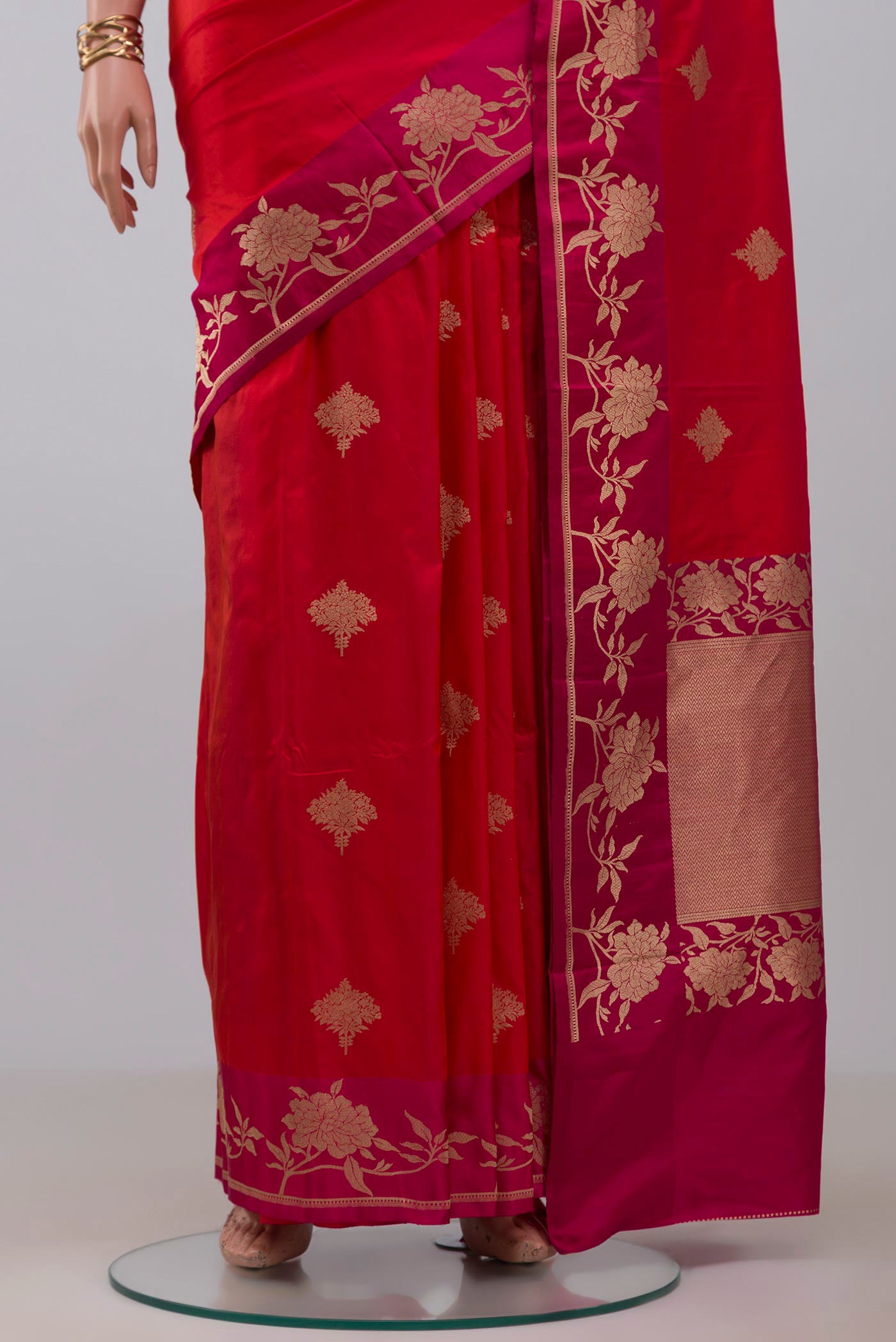 Pleats and pallu of Pink Banarasi Katan Silk Saree with Zari Butta on the body and Fancy Border. 