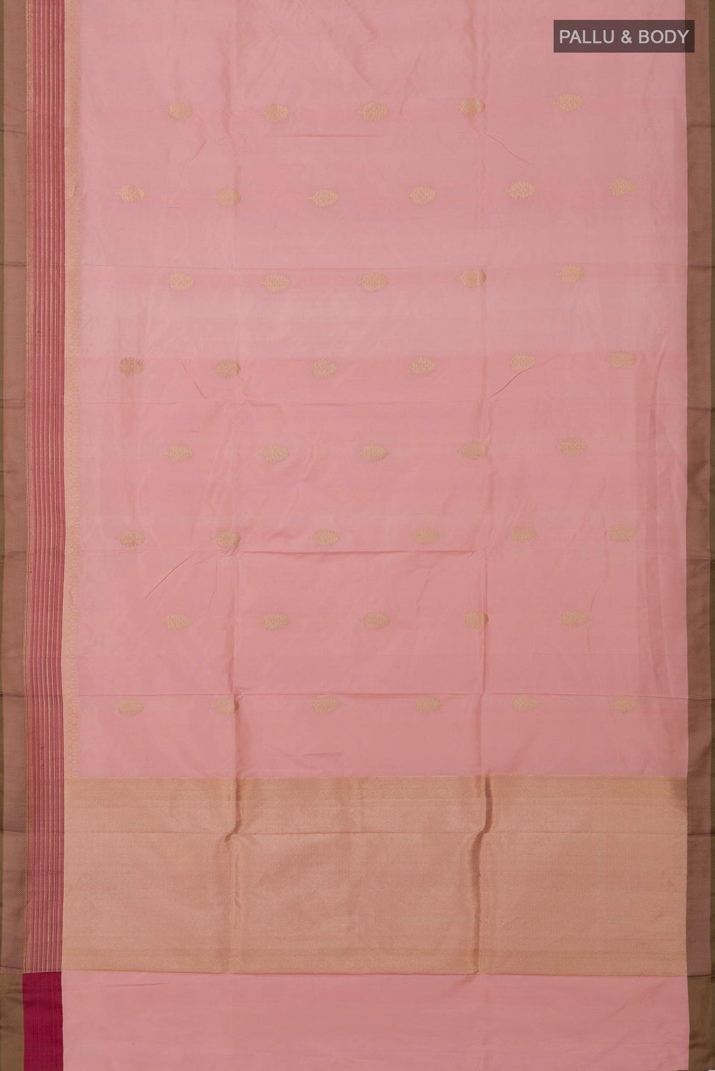Flat view of Rose Gold Banarasi Katan Silk Saree with Zari Butta on the body and Fancy Border. 