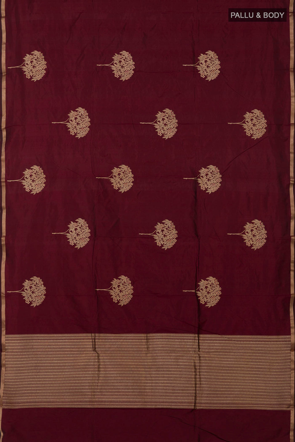 Flat view of Maroon Banarasi Katan Silk Saree with Zari Butta on the body and Thin Zari Line. 
