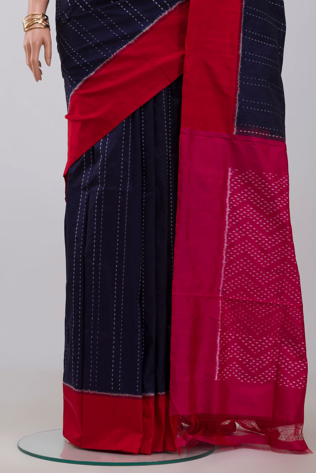 Pleats and pallu of Navy Blue Pochampally Silk Saree with Ikat design on the body and Plain Border. 