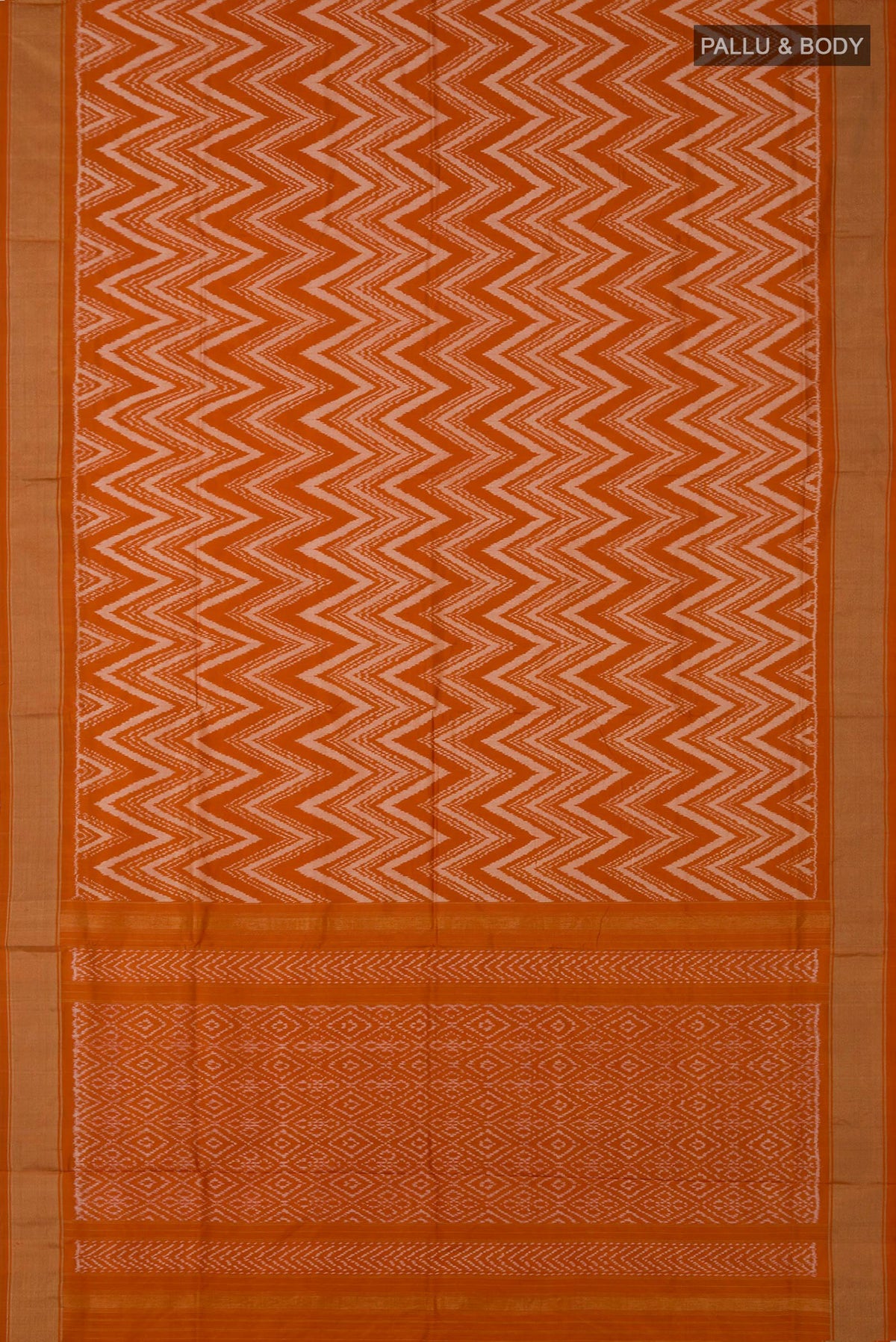 Flat view of Rust Pochampally Saree with Ikat design on the body and Zari Border. 