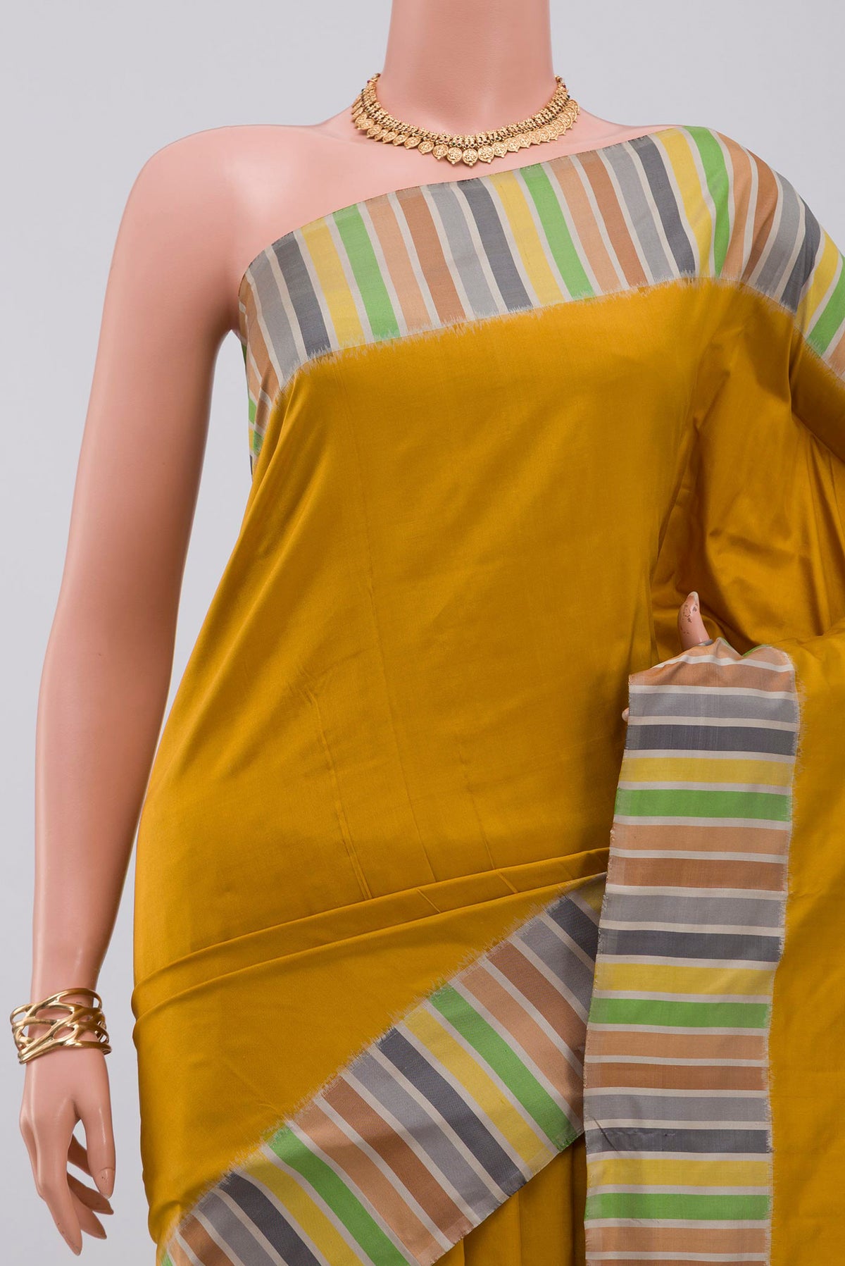 Border image of Mustard Pochampally Silk Saree with Plain Body and Plain Border. 