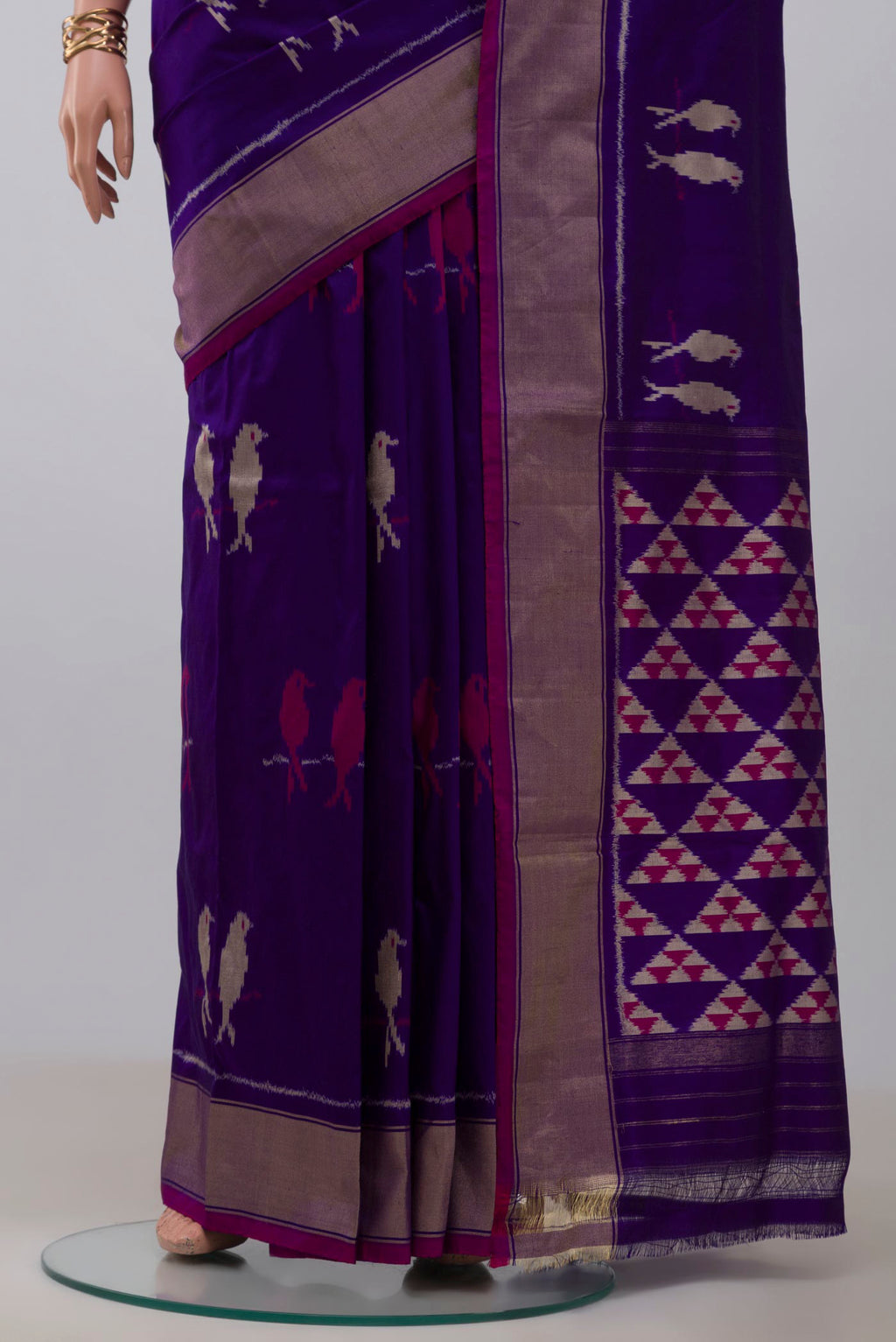 Pleats and pallu of Purple Pochampally Saree with Ikat design on the body and Zari Border. 