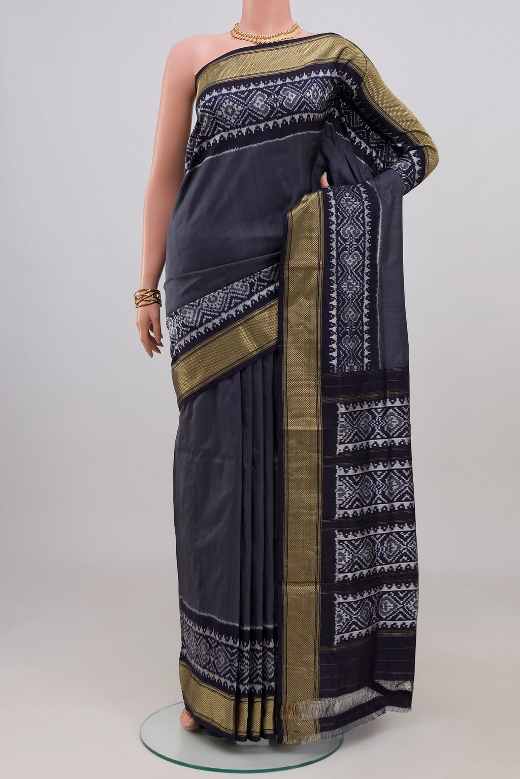 Blue Grey Pochampally Silk Saree with Plain Body and Zari Border.  displayed on a mannequin