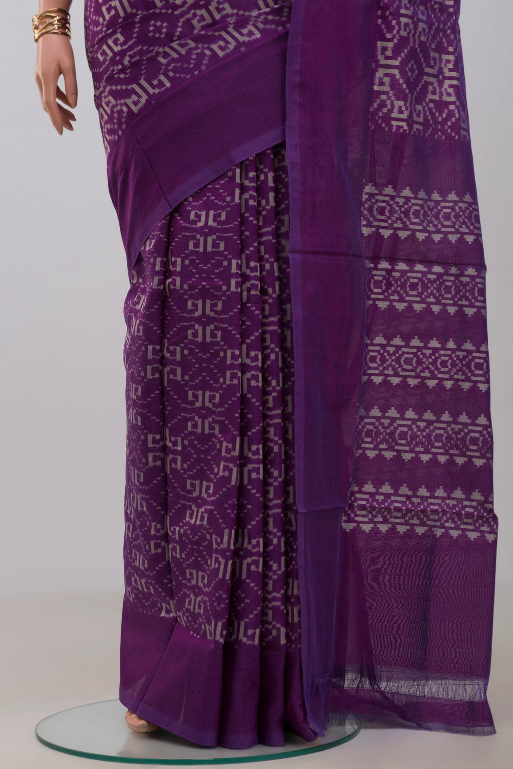 Pleats and pallu of Pure Silk Pure Zari Purple Pochampally Saree with Ikat Print on the body and Plain Border. 