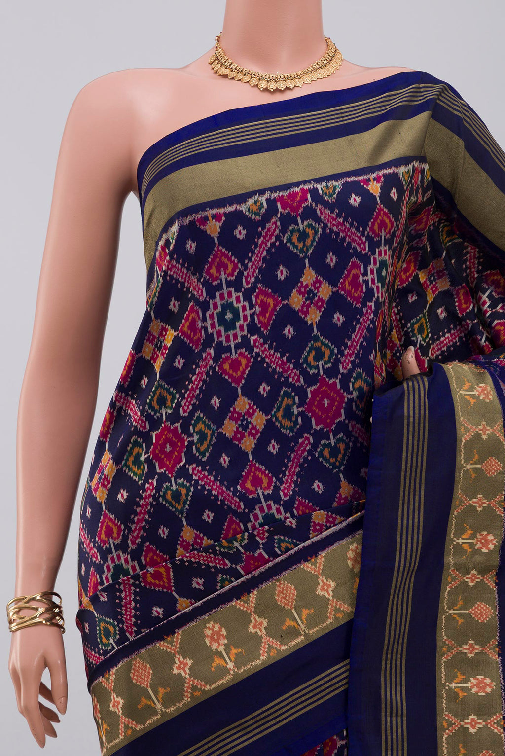 Border image of Blue Pochampally Saree with Ikat Print on the body and Zari Border. 