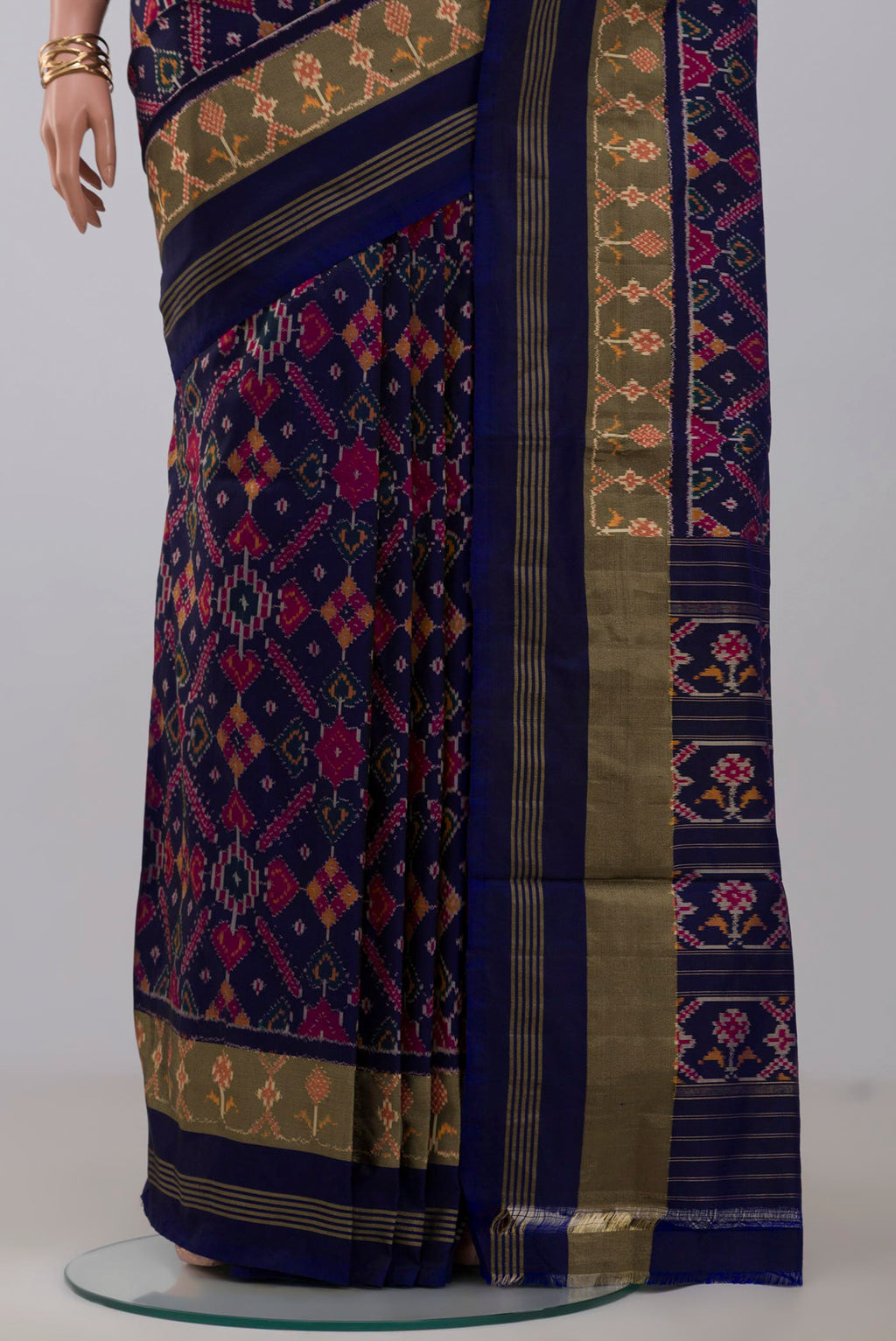 Pleats and pallu of Blue Pochampally Saree with Ikat Print on the body and Zari Border. 