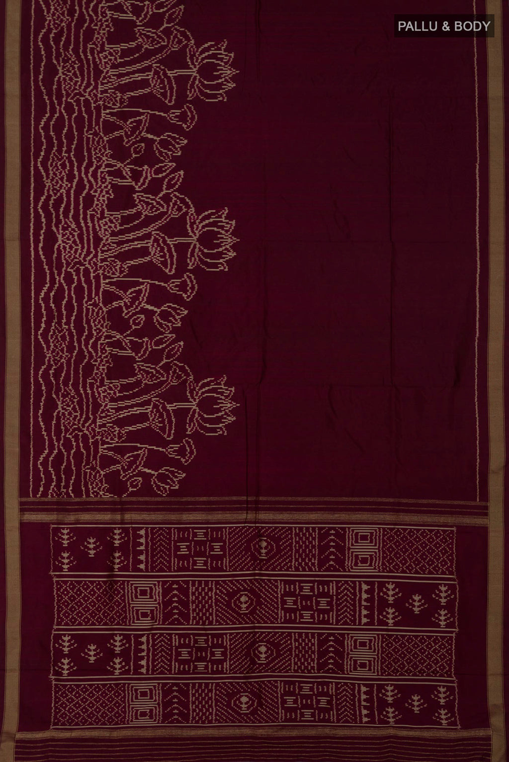 Flat view of Brown Pochampally Silk Saree with Ikat design on the body and Zari Border. 