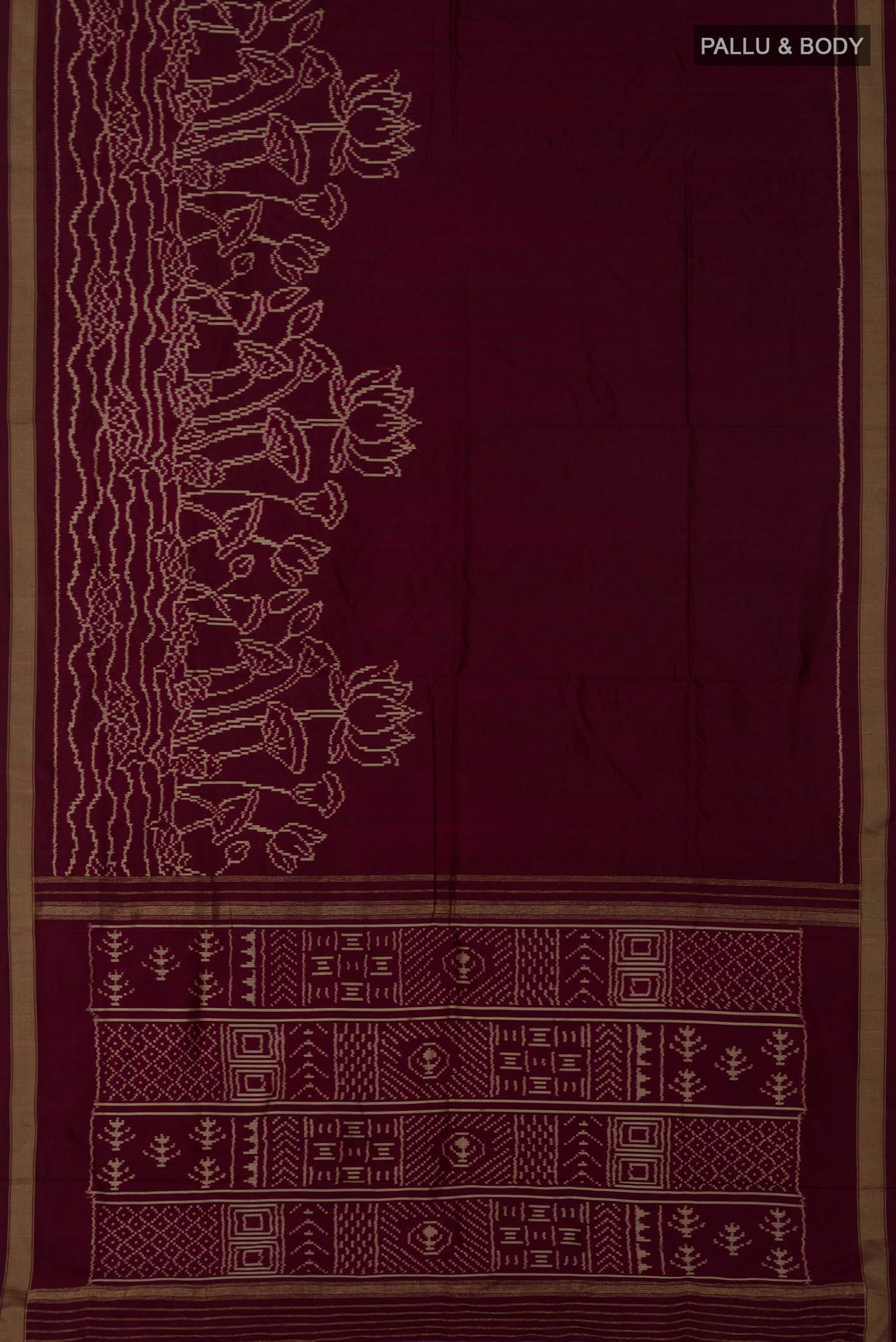 Flat view of Brown Pochampally Silk Saree with Ikat design on the body and Zari Border. 
