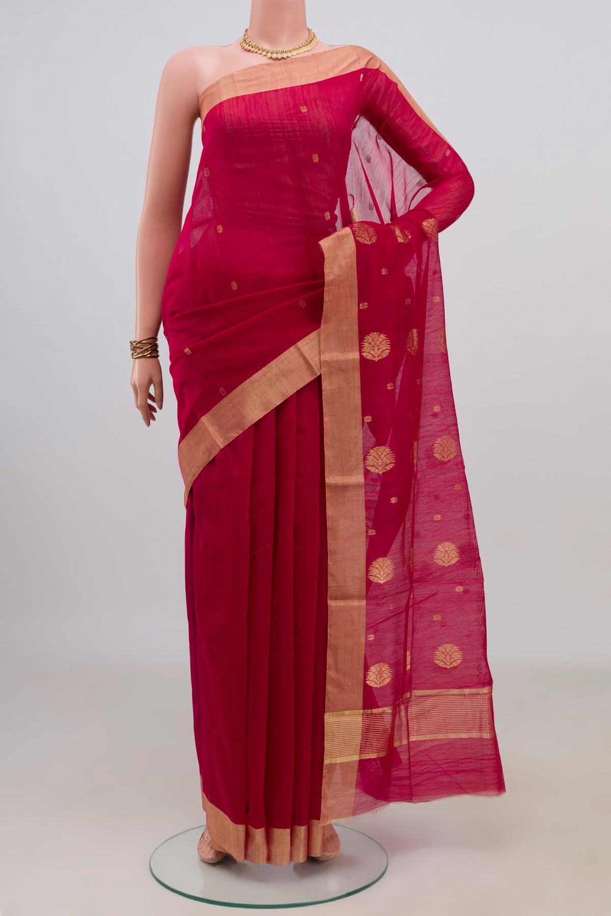 Red Chanderi Cotton Saree with Zari Butta on the body and Zari Border.  displayed on a mannequin
