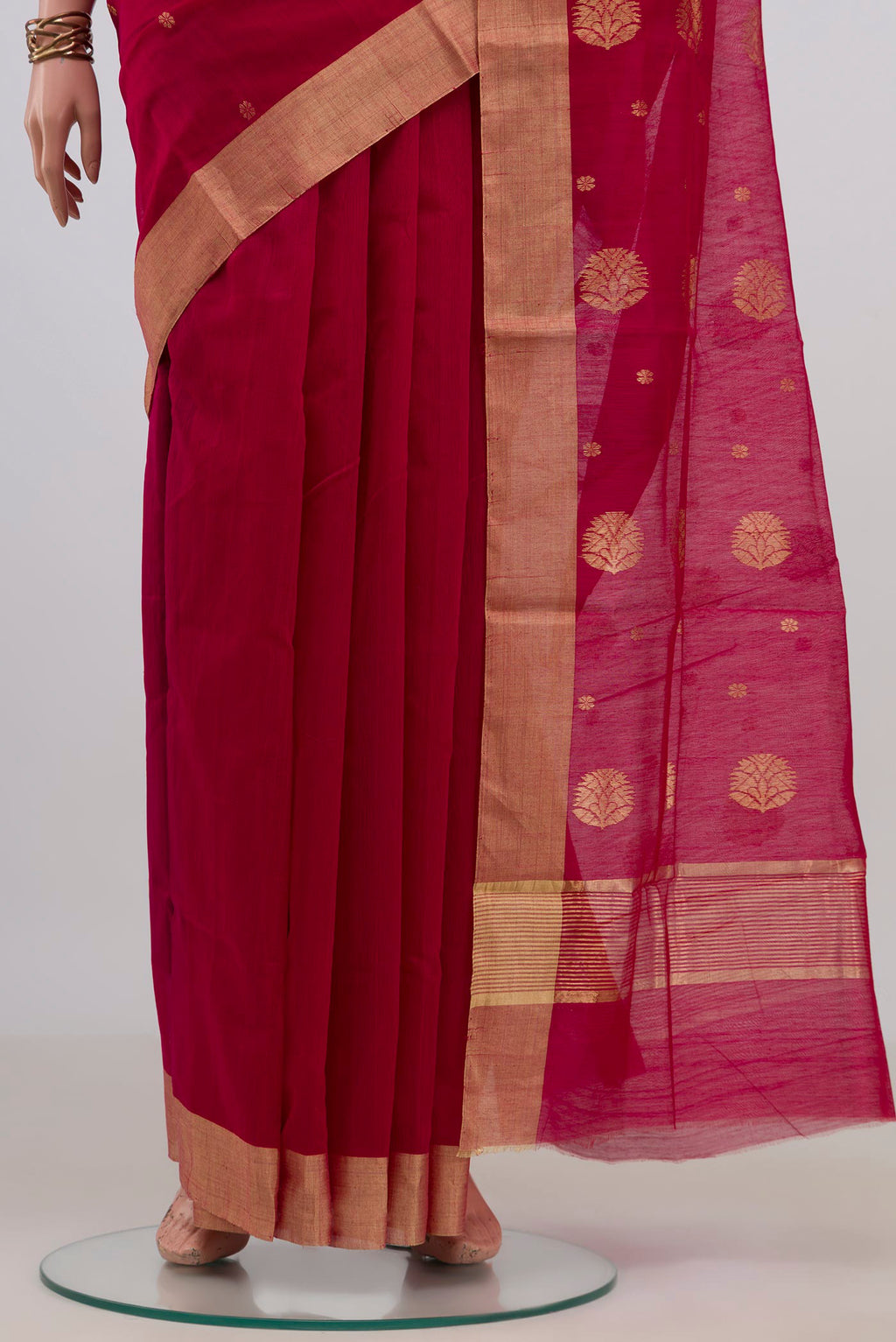 Pleats and pallu of Red Chanderi Cotton Saree with Zari Butta on the body and Zari Border. 