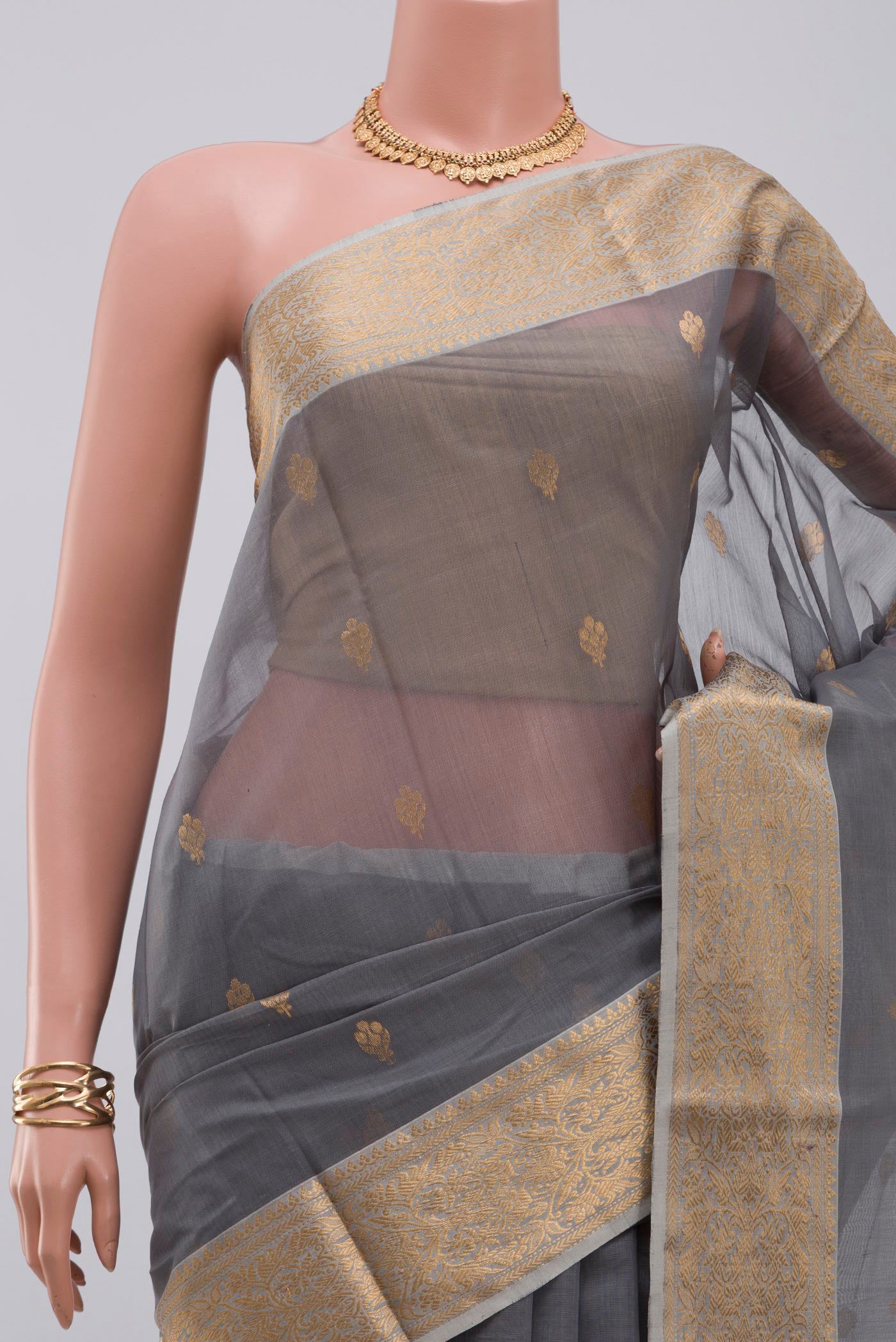 Border image of Grey Chanderi Silk Cotton Saree with Zari Butta on the body and Zari Border. 