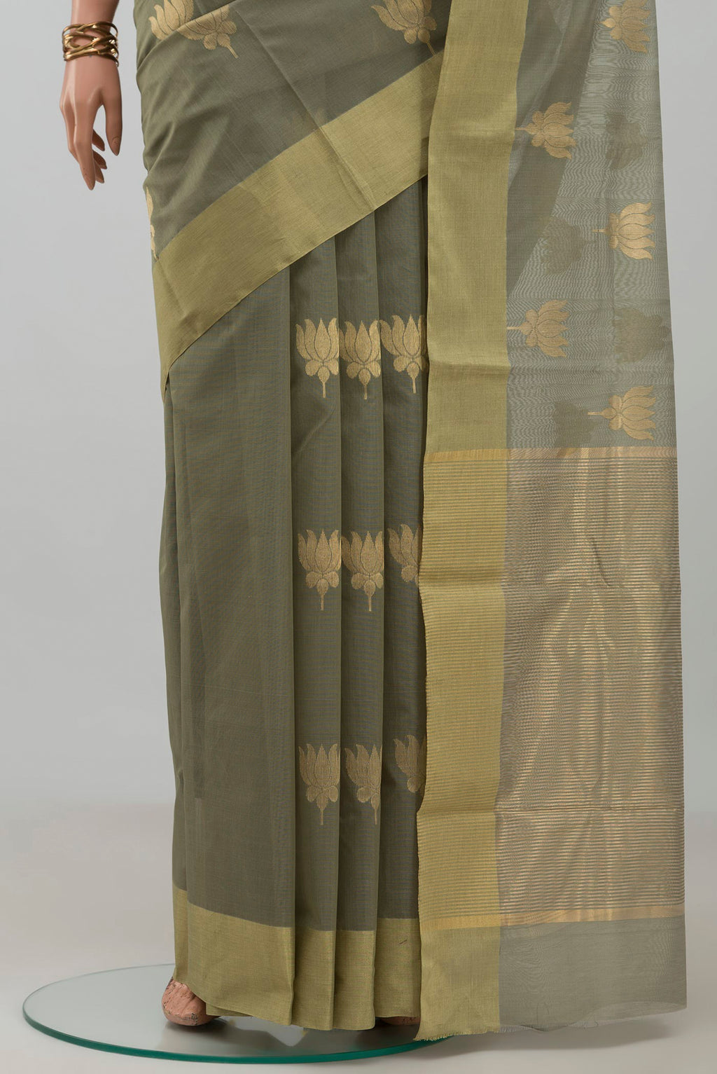 Pleats and pallu of Sage Green Chanderi Silk Cotton Saree with Zari Butta on the body and Zari Border. 