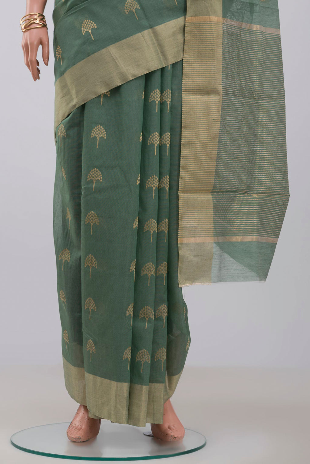 Pleats and pallu of Pista Green Chanderi Silk Cotton Saree with Zari Butta on the body and Zari Border. 