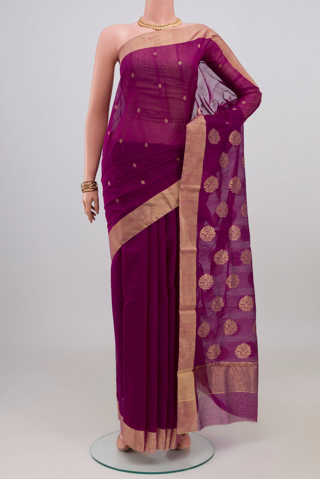 Purple Chanderi Silk Cotton Saree with Zari Butta on the body and Zari Border.  displayed on a mannequin