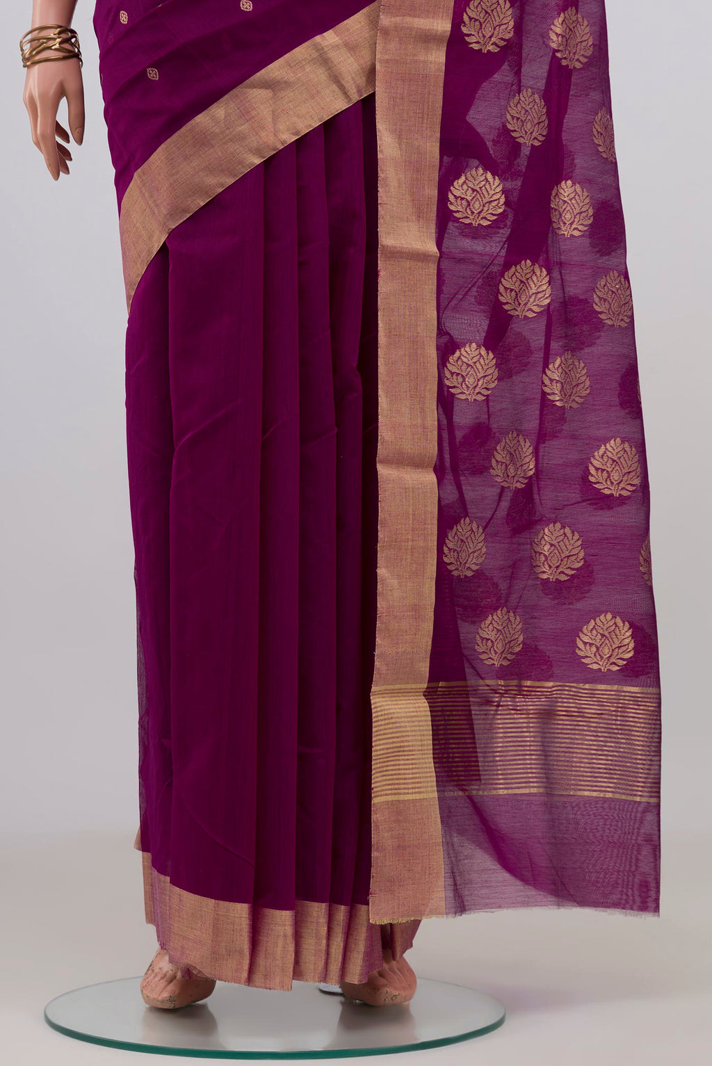 Pleats and pallu of Purple Chanderi Silk Cotton Saree with Zari Butta on the body and Zari Border. 