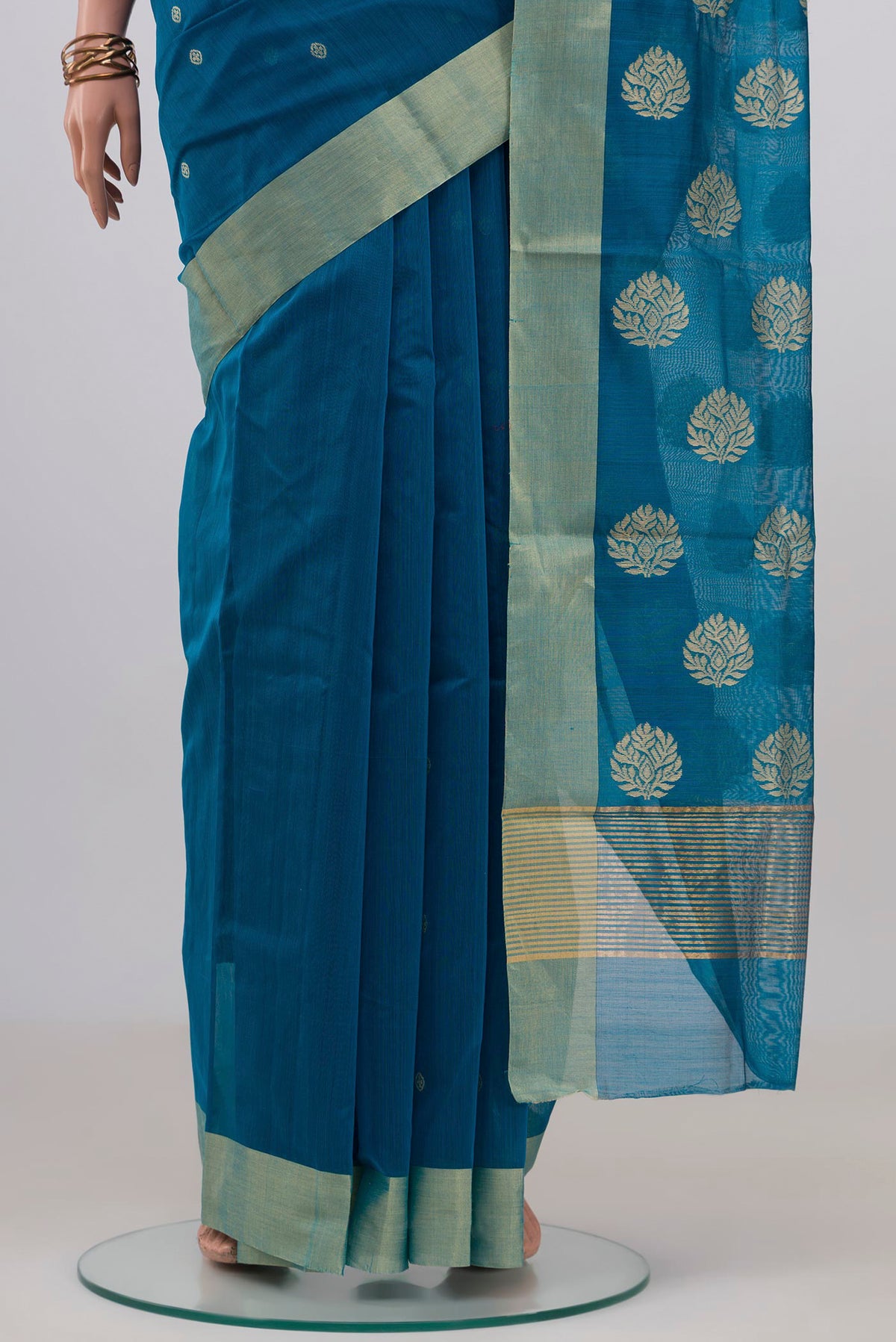 Pleats and pallu of Blue Chanderi Silk Cotton Saree with Zari Butta on the body and Zari Border. 