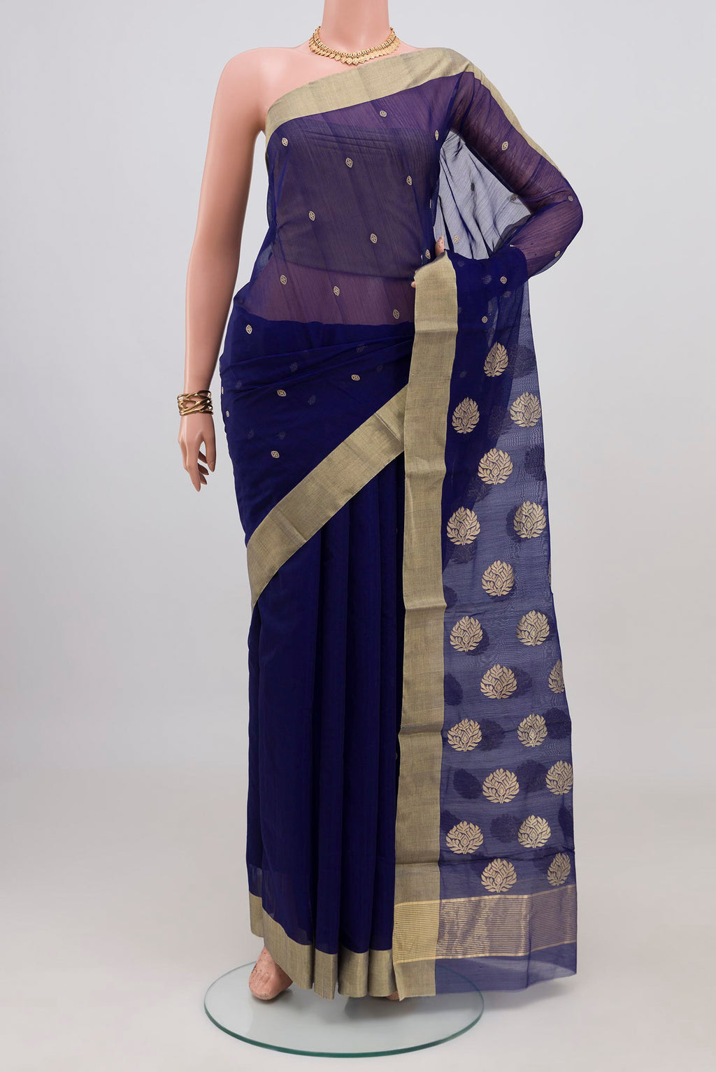 Navy Blue Chanderi Silk Cotton Saree with Zari Butta on the body and Zari Border.  displayed on a mannequin