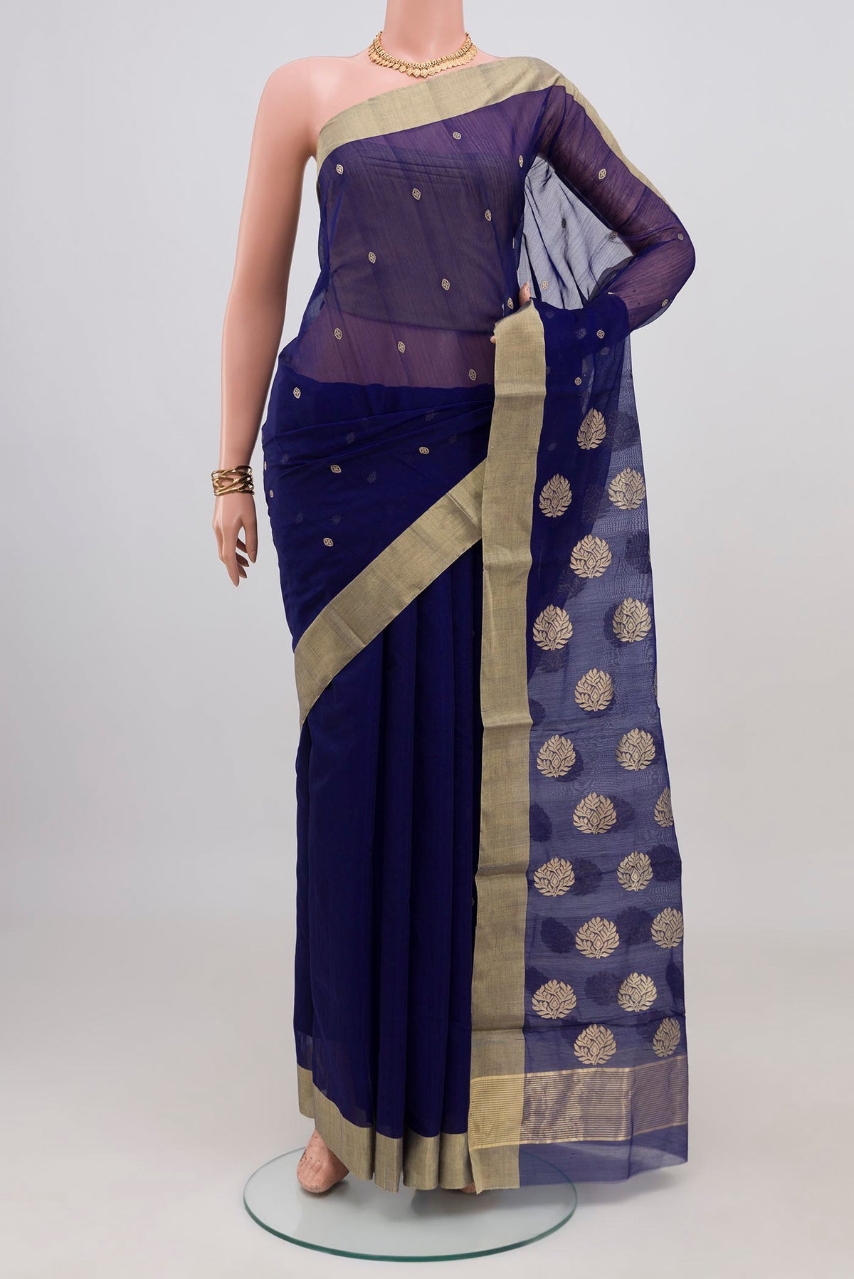 Navy Blue Chanderi Silk Cotton Saree with Zari Butta on the body and Zari Border.  displayed on a mannequin