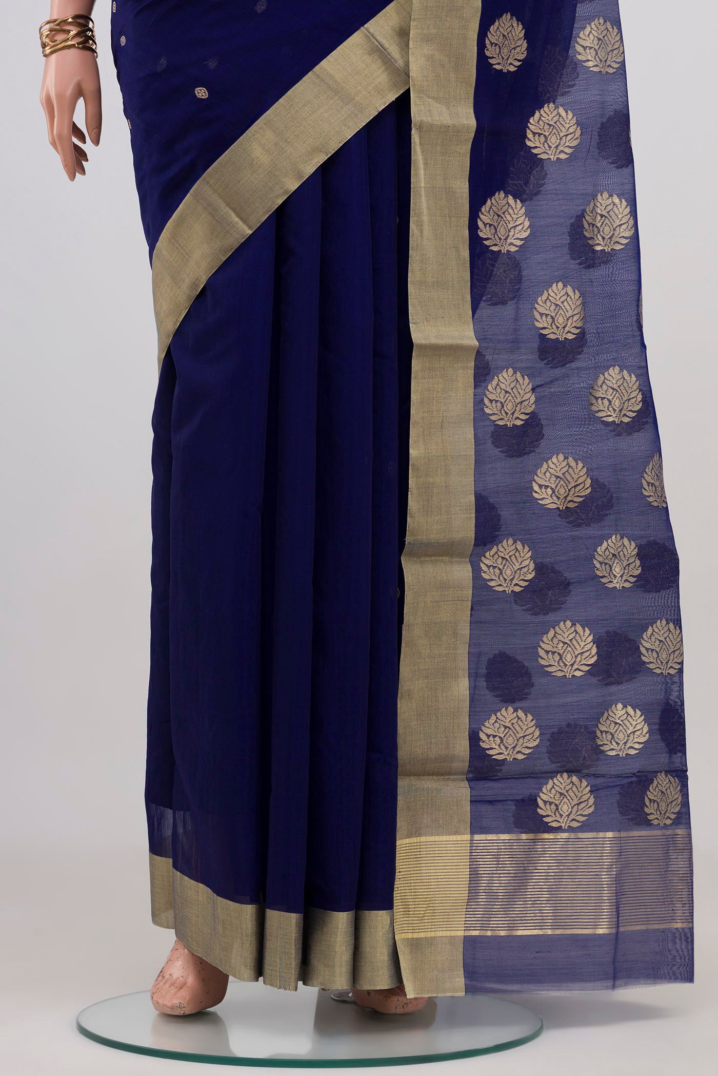 Pleats and pallu of Navy Blue Chanderi Silk Cotton Saree with Zari Butta on the body and Zari Border. 