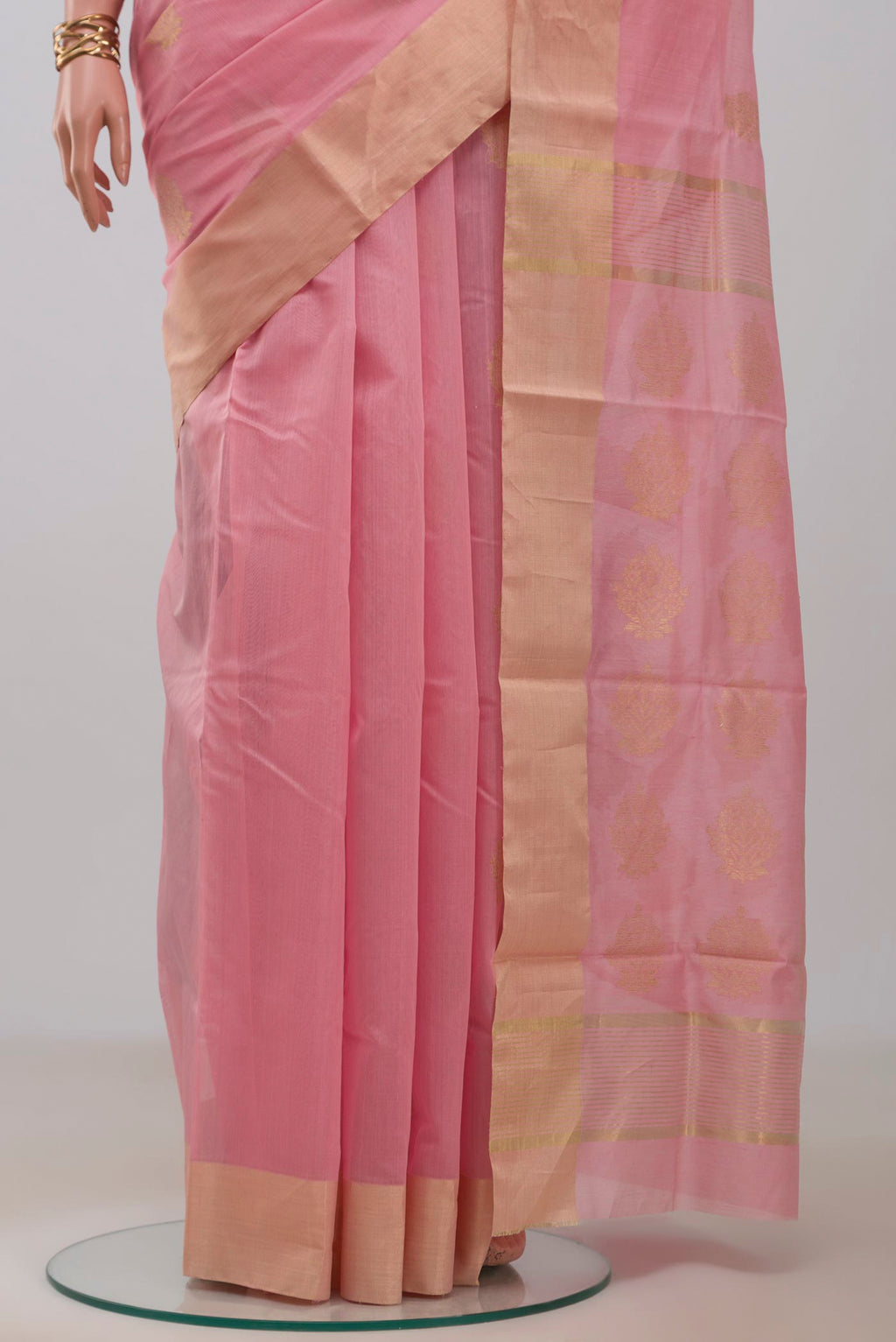 Pleats and pallu of Rose pink Chanderi Silk Cotton Saree with Zari Butta on the body and Zari Border. 