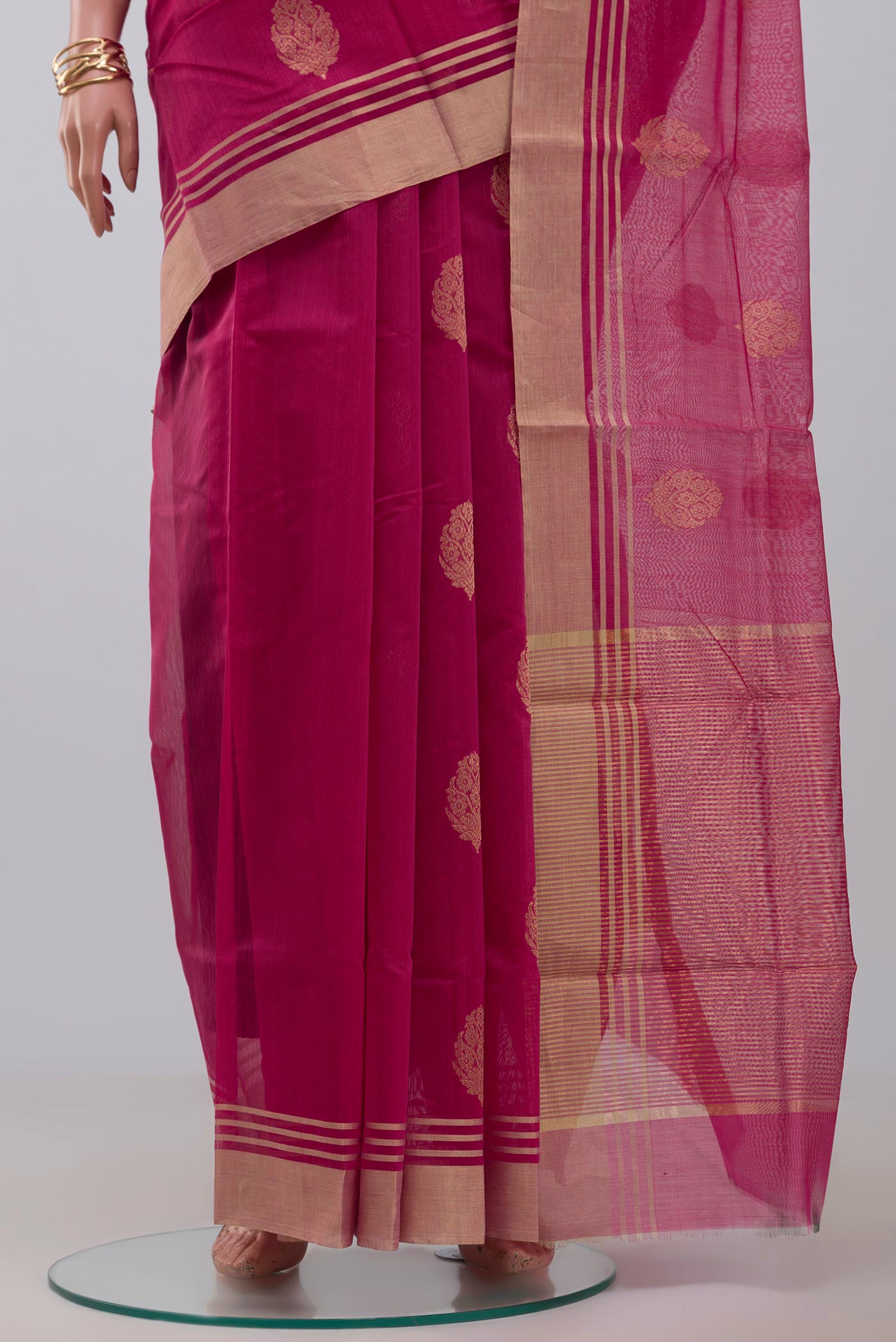 Pleats and pallu of Pink Chanderi Silk Cotton Saree with Zari Butta on the body and Zari Border. 