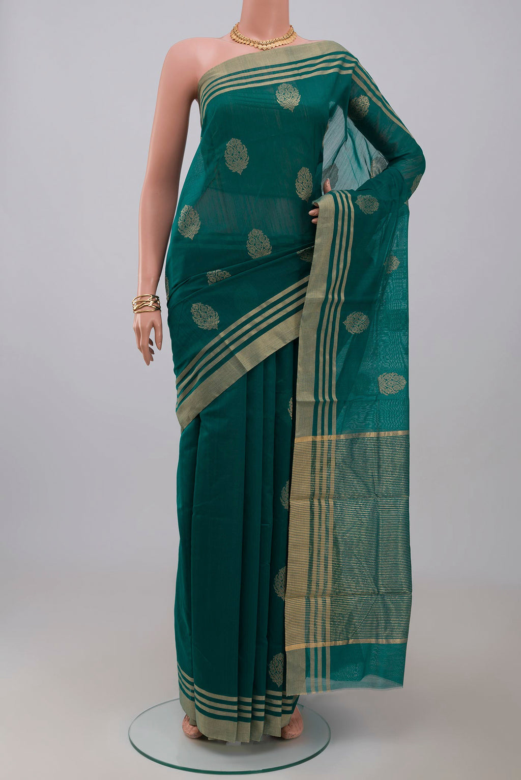 Blue Chanderi Silk Cotton Saree with Zari Butta on the body and Zari Border.  displayed on a mannequin