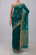 Blue Chanderi Silk Cotton Saree with Zari Butta on the body and Zari Border.  displayed on a mannequin