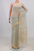 Grey Chanderi Cotton Saree with Zari Butta on the body and Zari Border.  displayed on a mannequin