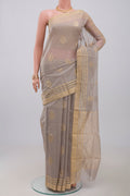 Grey Chanderi Silk Cotton Saree with Zari Butta on the body and Zari Border.  displayed on a mannequin